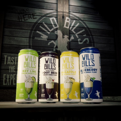 Four cans of Wild Bill's Cream Soda Floats in front of a wooden background with the brand logo.