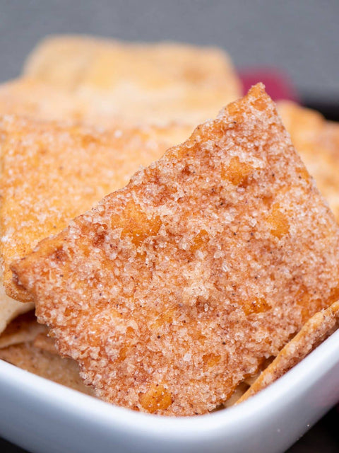 Close-up of sugary sourdough crackers in a bowl